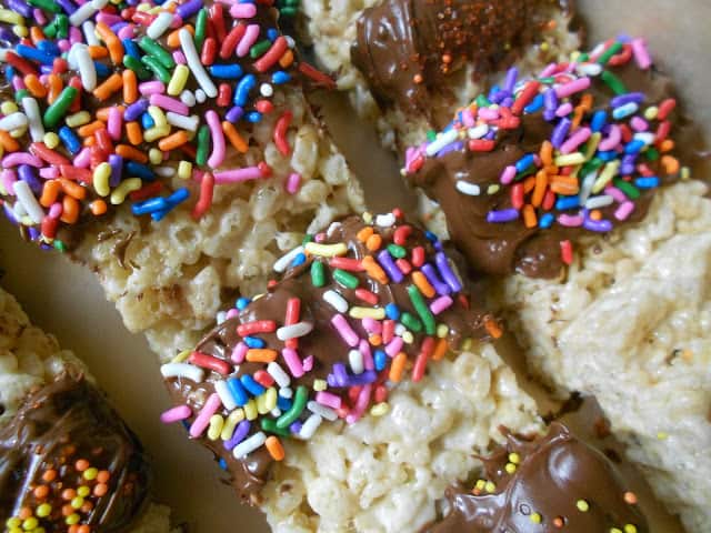 Chocolate dipped Rice Krispy treats with sprinkles are fun to make with the kids!
