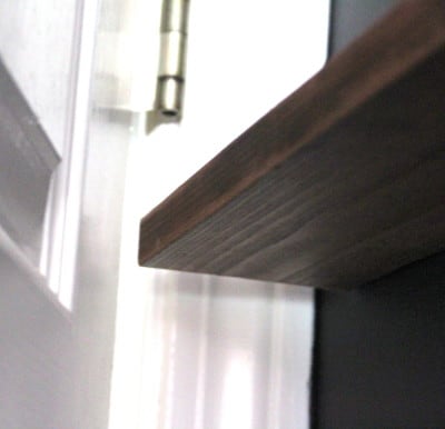 If one of the picture ledges runs behind a door make sure there is clearance to open the door without hitting it.