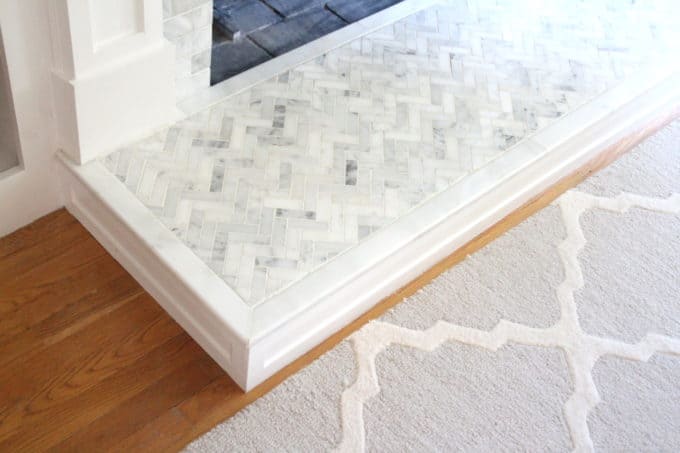 Marble tiled heart and neutral rug