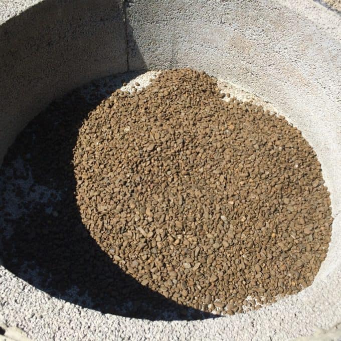 Use inexepensive gravel to line the interior of a fire pit.