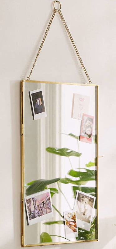 Urban Outfitters Mirror doubles as a photo frame.