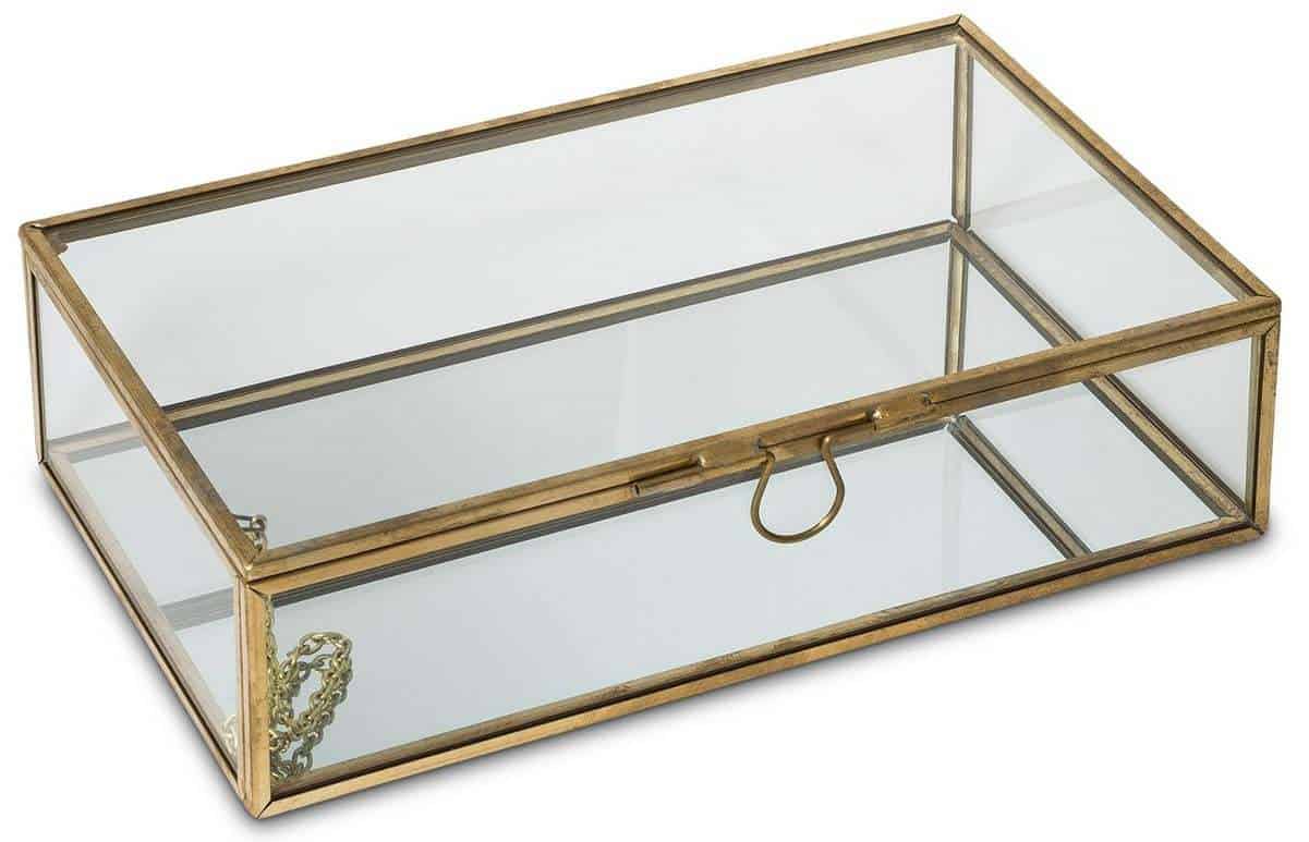A gold and glass jewelry box is pretty and functional.