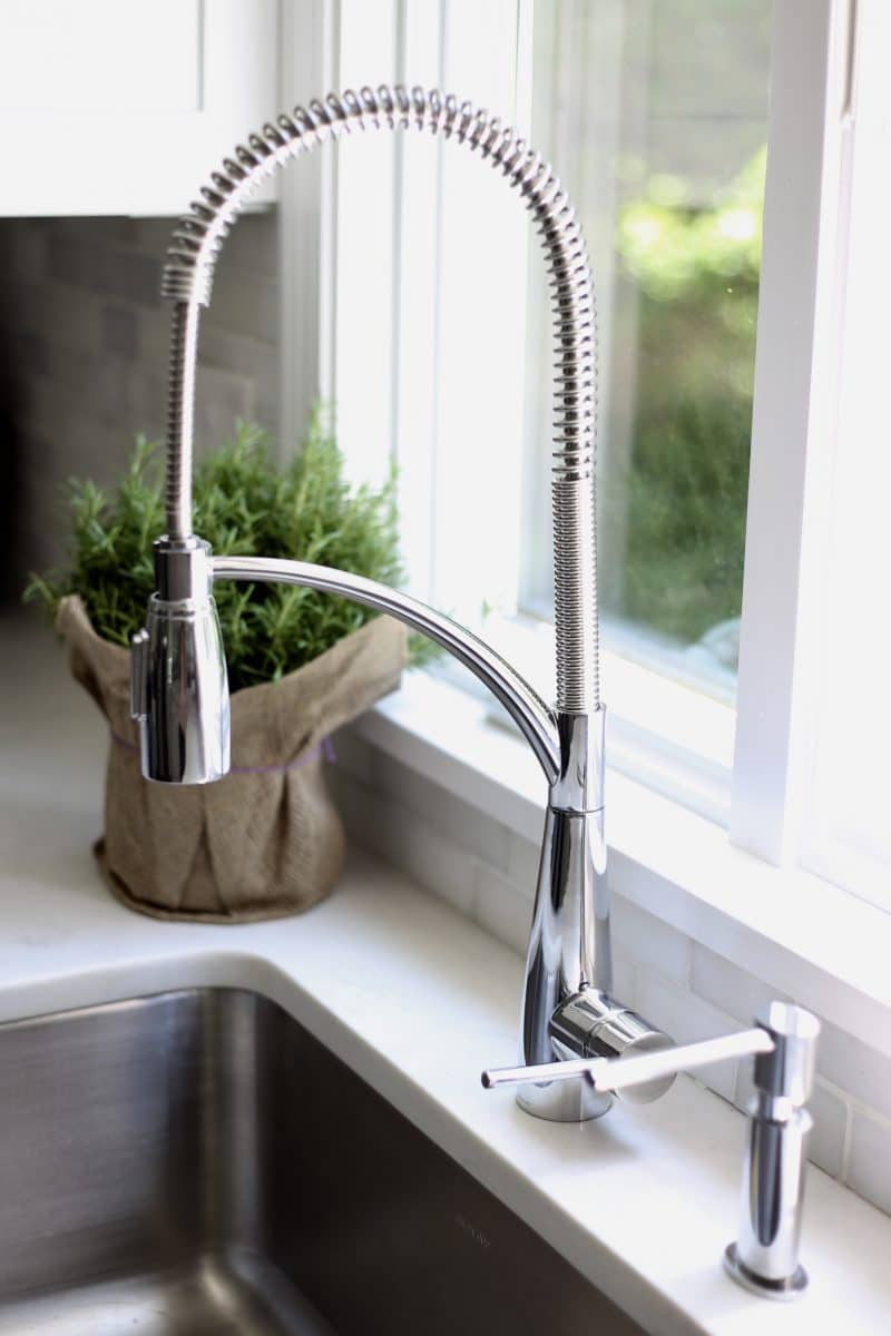 Elkay stainless steel sink and chrome faucet
